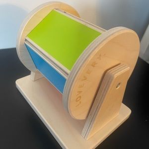 Lovevery spinning rainbow Montessori toy